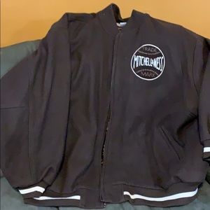 Mitchell and Ness varsity coach